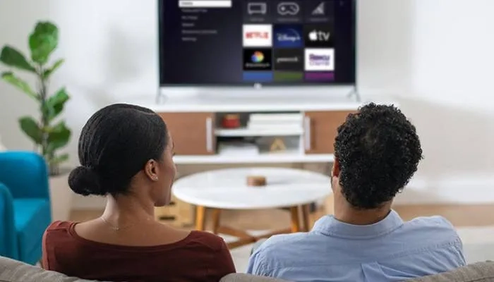 A couple watching TV